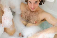 Sexy-hairy-chested-young-dude-Reece-Anderson-jerks-huge-uncut-dick-bath-tub-at-Bentley-Race-12-porno-gay-pics