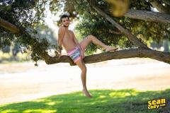 Young-bearded-muscle-dude-Sean-Cody-Griffin-strips-off-swim-trunks-wanking-massive-erect-cock-4-porno-gay-pics