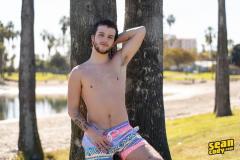 Young-bearded-muscle-dude-Sean-Cody-Griffin-strips-off-swim-trunks-wanking-massive-erect-cock-5-porno-gay-pics