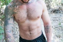 Hottie-hairy-Rocke-strips-out-of-shorts-wanking-huge-thick-cock-Reality-Dudes-4-porno-gay-pics